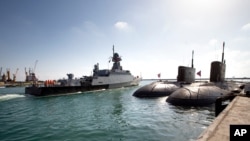 FILE - A Russian navy missile ship 'Veliky Ustyug' sails off from the Russian naval facility in Tartus, Syria, on patrol in eastern Mediterranean, Sept. 26, 2019.