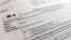 FILE - A W-4 form on Feb. 5, 2020, in New York. The IRS will receive tens of millions of filings electronically and through paper forms.