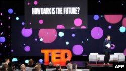 FILE - TED Conference curator Chris Anderson leads a discussion on whether optimists or pessimists are right about the future during the TED Conference on April 12, 2018, in Vancouver, Canada.