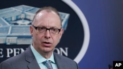 Dr. John F. Huth, DIA Defense Intelligence Officer for Space and Counterspace, speaks during a briefing at the Pentagon in Washington, Tuesday, April 12, 2022, on the release of "Challenges in Security in Space Report – 2022."