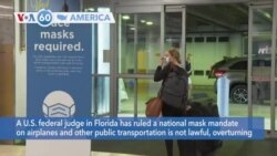 VOA60 America - US Judge Strikes Down National Mask Mandate on Airplanes and Trains