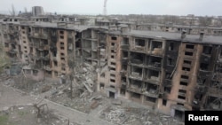 تصویری هوایی از ساختمان‌های ویران شده در شهر ماریوپل در جنوب‌ شرقی اوکراین (۱۸ آوریل ۲۰۲۲)