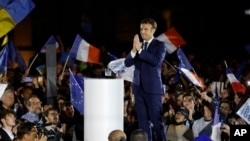 FILE - French President and centrist presidential candidate for reelection Emmanuel Macron delivers a speech during a campaign rally in Strasbourg, France, April 12, 2022.