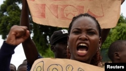 FILE - Hilda Flavia Nakabuye coordinator of 'Fridays for Future' leads Ugandan students in taking part in the global 'School Strike for Climate' in Kampala, Uganda May 24, 2019.