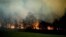 A bushfire burns in Bodalla, New South Wales, Australia, Jan. 25, 2020. 