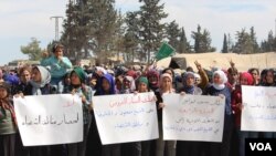 Displaced Afrin Kurds protest Assad government's seige on Kurdish neighborhoods in Aleppo