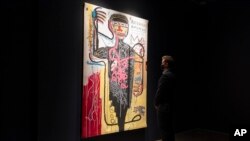 Foto Achiv: Tablo atis Jean-Michel Basquiat ki rele "Versus Medici" nan Nouyok, 3 Me 2021. 