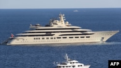 FILE: The luxury superyacht "Dilbar" sails off the coasts of Monaco, April 20, 2017.