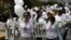 Ciudadanos de Ciudad Juárez marchan en protesta por los asesinatos y desapariciones de mujeres en esta la ciudad fronteriza con Estados Unidos, el 29 de mayo de 2005. 