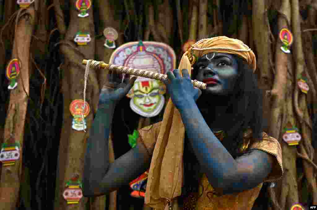 A student takes part in Tamil New Year and Vishu celebrations in Chennai, India.