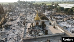 MYANMAR-POLITICS/BURNING စစ်ကိုင်းတိုင်း ဒေသကြီး ၊ မင်းကင်းမြို့နယ်အတွင်းက ကျေးရွာတရွာမီးရှို့ခံခဲ့ရစဉ် (မှတ်တမ်းဓါတ်ပုံ)
