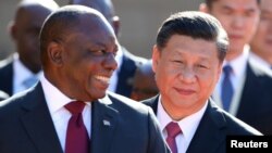 资料照：南非总统拉马福萨在比勒陀利亚会晤到访的中国领导人习近平。（2018年7月24日）