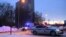 FILE - A police van with escort vehicle is seen driving down a street in Moscow, Russia, Feb. 20, 2021. 