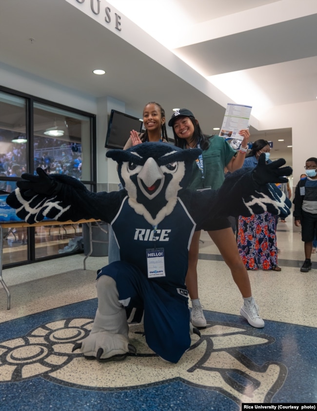 Students visited Rice University and posed with the school's mascot, an owl, during the recent Owl Days.