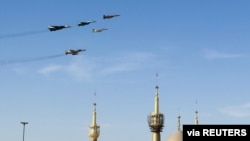 Fighter jets are seen during a ceremony of the National Army Day parade in Tehran, Iran April 18, 2022. Iranian Army/WANA (West Asia News Agency)/Handout via Reuters) 