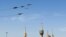 Fighter jets are seen during a ceremony of the National Army Day parade in Tehran, Iran April 18, 2022. Iranian Army/WANA (West Asia News Agency)/Handout via Reuters) 
