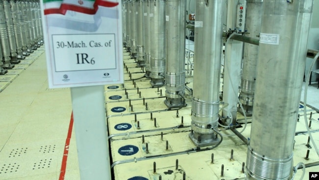 FILE - This file photo released Nov. 5, 2019, by the Atomic Energy Organization of Iran shows centrifuge machines in the Natanz uranium enrichment facility in central Iran.