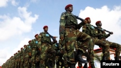 FILE: Somali military officers march in a parade during celebrations to mark the 62nd anniversary of the Somali National Armed Forces in Mogadishu, Somalia. Taken April 12, 2022