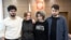 (L-R) Student news site DOXA journalists Armen Aramyan, Natalia Tyshkevich, Alla Gutnikova and Vladimir Metelkin, charged with inciting minors to protest, attend a court hearing in Moscow, March 31, 2022.