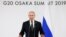 El presidente ruso, Vladimir Putin, habla con los medios de comunicación en la cumbre del G-20 en Osaka, oeste de Japón.