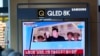 People watch a TV screen show a news program reporting North Korean leader Kim Jong Un was observing a test-firing of a newly developed tactical guided weapon, at a train station in Seoul, South Korea, Apr. 17, 2022.