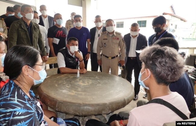 FILE - Pol Lt Gen Surachate Hakparn, Assistant to Thai Police Commissioner speaks to Thai victims rescued from scam call centres in Phnom Penh, Cambodia, in this undated handout picture released by Thai police on April 12, 2022.