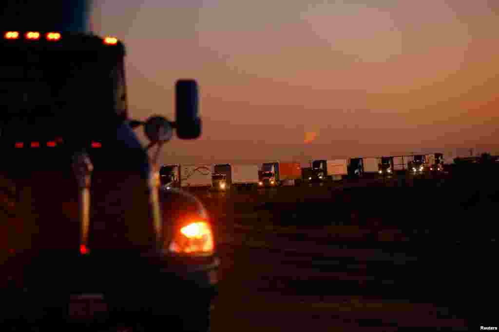 Trucks wait to cross into the United States on the Jeronimo-Santa Teresa International Bridge connecting Ciudad Juarez, Mexico, to Santa Teresa, New Mexico.