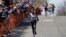 FILE: As he did today, Evans Chebet of Kenya leads the pack of runners on his way to win the men's division of the Boston Marathon, April 18, 2022. 