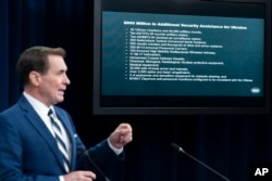 Pentagon spokesman John Kirby discusses a list of security items the U.S. is providing to Ukraine during a media briefing at the Pentagon, April 13, 2022.