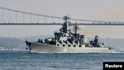 FILE - The Russian Navy's guided missile cruiser Moskva sails in the Bosphorus, on its way to the Mediterranean Sea, in Istanbul, June 18, 2021.