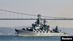 FILE - The Russian navy's guided missile cruiser Moskva sails in the Bosphorus, on its way to the Mediterranean Sea, in Istanbul, June 18, 2021.