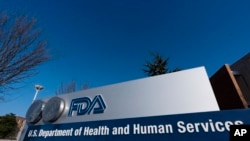 FILE - A sign for the Food and Drug Administration is seen in Silver Spring, Md., Dec. 10, 2020.