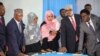 Somali lawmakers are sworn-in to office at a ceremony held in the capital's heavily fortified Halane military camp in Mogadishu, Somalia, April 14, 2022. 