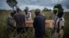 Pallbearers at the border of South Sudan and Uganda carry the casket containing the remains of Duku Evans, a civilian killed November 3 amid fighting between government troops and rebels in Logo displaced persons camp in Kajo Keji, South Sudan, Nov. 5, 2017.