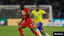 Ghanaian Forward Inaki Williams takes on Brazilian defender, Bremer during an international friendly held in France, September 23, 2022