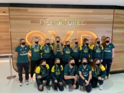 Members of Australia’s Olympic softball squad at Sydney Airport on May 31, 2021 before their departure for a pre-Games training camp in Ota, Gunma Prefecture, Japan. The squad will be among the first athletes to arrive in Japan from overseas.