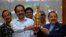 Indian Space Research Organisation (ISRO) chief S. Somanath (2L) and Minister of State for the Ministry of Science and Technology Jitendra Singh (R) hold a model of spacecraft Chandrayaan-3 during a press conference, after its launch from the Satish Dhawa