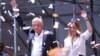 Presidential candidate Andres Manuel Lopez Obrador gestures with his wife Beatriz Gutierrez Muller as he addresses supporters in Mexico City, Mexico, July 1, 2018. 