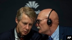 Director general of the GSMA Mats Granryd, left, and CEO and Director for GSMA Ltd. John Hoffman take part in a press conference in Barcelona, Spain, Feb. 13, 2020. 