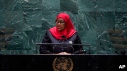 FILE - Tanzanian President Samia Suluhu Hassan addresses the 76th Session of the U.N. General Assembly at U.N. headquarters in New York, Sept. 23, 2021.