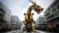 Operators drive the dragon-horse called Long-Ma, created by Francois de la Roziere and his company "La Machine", in the streets of Toulouse, southern France, April 16, 2022.