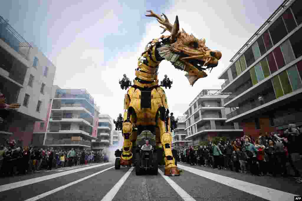 Operators drive the dragon-horse called Long-Ma, created by Francois de la Roziere and his company &quot;La Machine&quot;, in the streets of Toulouse, southern France, April 16, 2022.