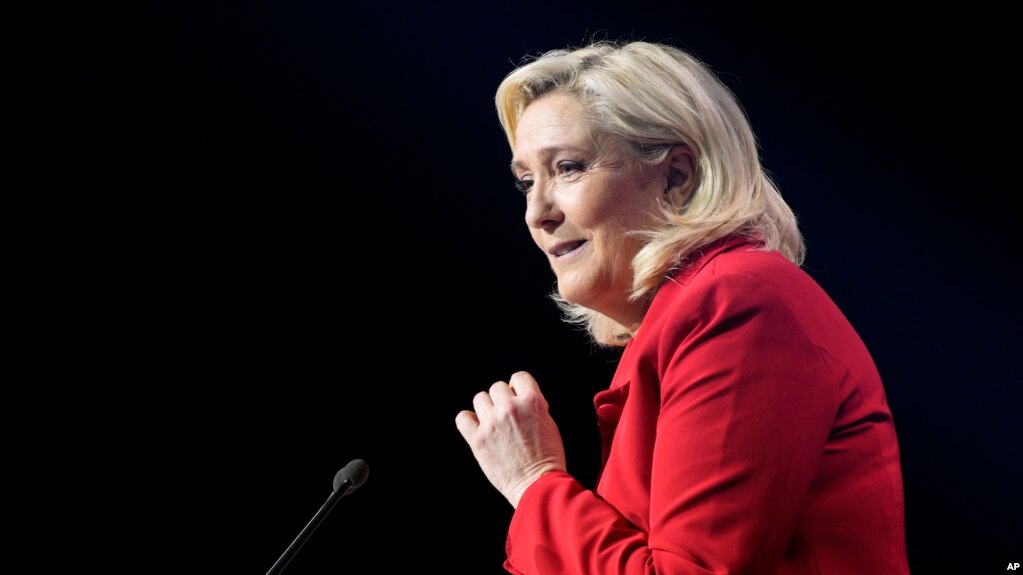 FILE - French far-right leader Marine Le Pen delivers a speech during a meeting in Avignon, France, April 14, 2022. Le Pen is trying to unseat centrist President Emmanuel Macron.
