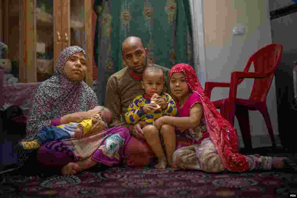 Tarek Mostafa and his family are among Egypt’s tens of millions of poor, saying they can now barely afford state subsidized housing. “Our living expenses are very high here,” he says, “and I haven&#39;t found a new job yet.” Cairo, April 5, 2022. (Hamada Elra