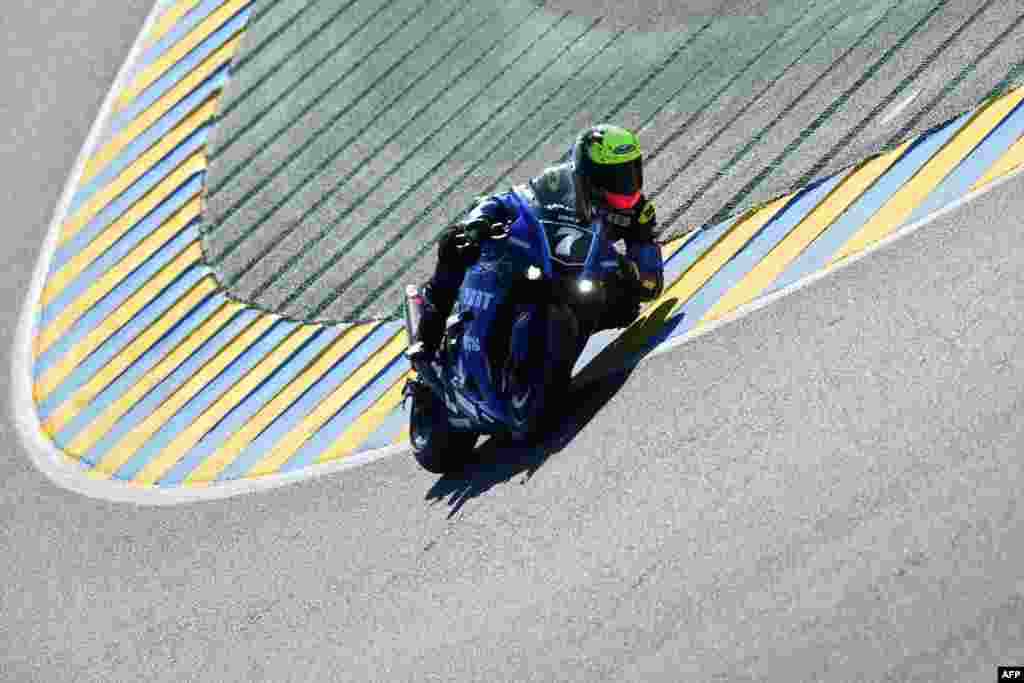 Italian rider Niccolo Canepa speeds through a qualifying session of the 45th 24 Hours of Le Mans motorcycle race in Le Mans, France. (Photo by JEAN-FRANCOIS MONIER / AFP)