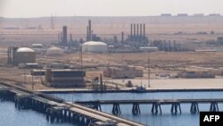 La Compagnie nationale de pétrole de Libye regrette "le début d'une douloureuse vague de fermetures" d'installations pétrolières.