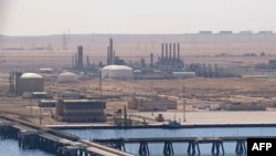 FILE: A picture taken on 9.24.2020 shows the Brega oil port in Marsa Brega, some 270kms west of Libya's eastern city of Benghazi.