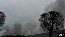 Дым над Киевом после ракетных ударов по украинской столице. 16 апреля 2022 года.