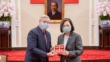 Taiwan President Tsai Ing-wen attends a meeting with U.S. Sen. Lindsey Graham at the presidential office in Taipei, Taiwan, in this handout picture released April 15, 2022.
