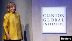 Former U.S. Secretary of State Hillary Clinton walks on stage at the Clinton Global Initiative 2014 in New York, Sept. 24, 2014.